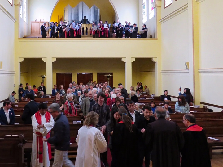 Picture of a worship leader singing